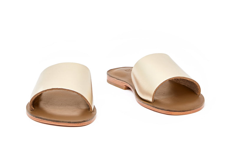 Front view of the handmade Rock women's slip-on leather sandals in olive insole with gold straps / GOLD